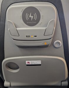 Back of bus seat featuring USB and wireless charging