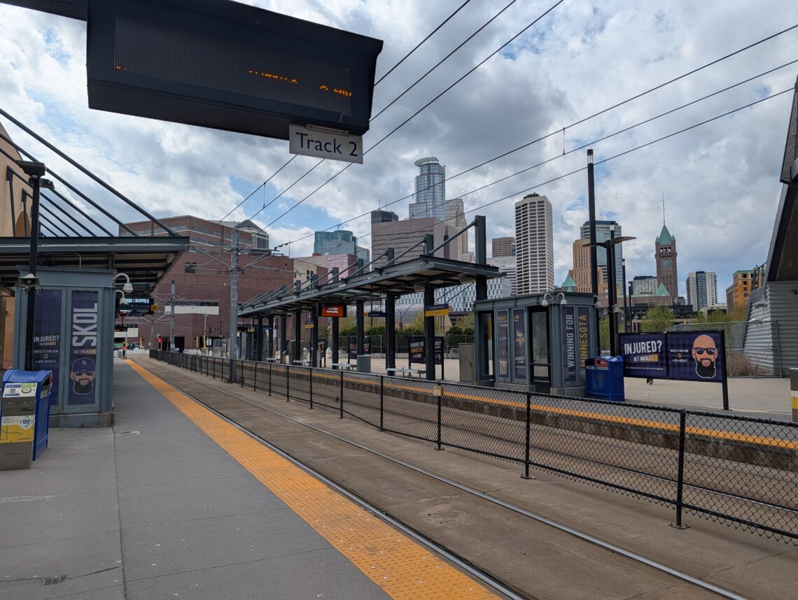Image of Light Rail Station with Minneapolis skyline in the background